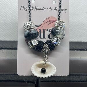 Elegant Black and Silver Beaded Necklace by [Brand]